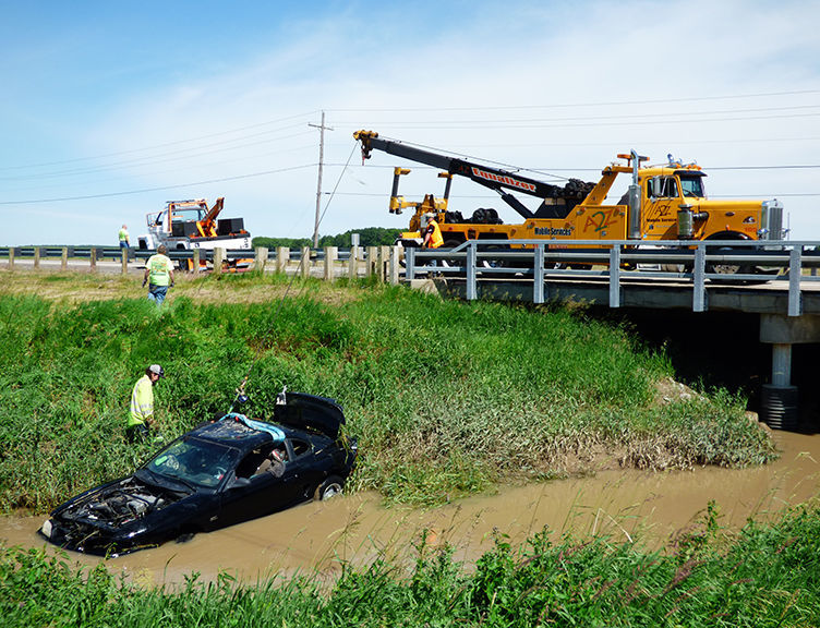 Vehicle retrieved from creek, no serious injuries